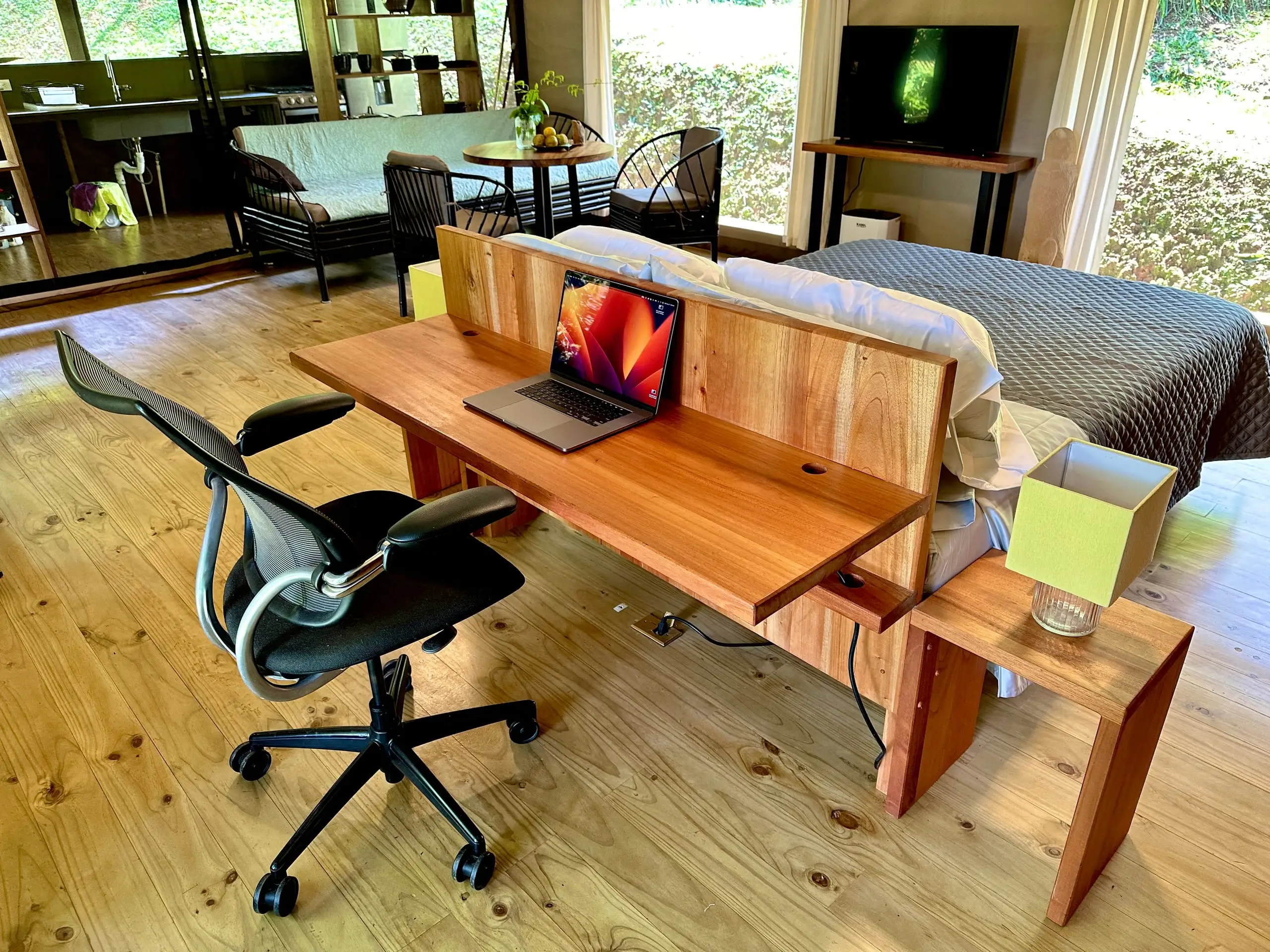 The long hardwood desk running the width of the tent