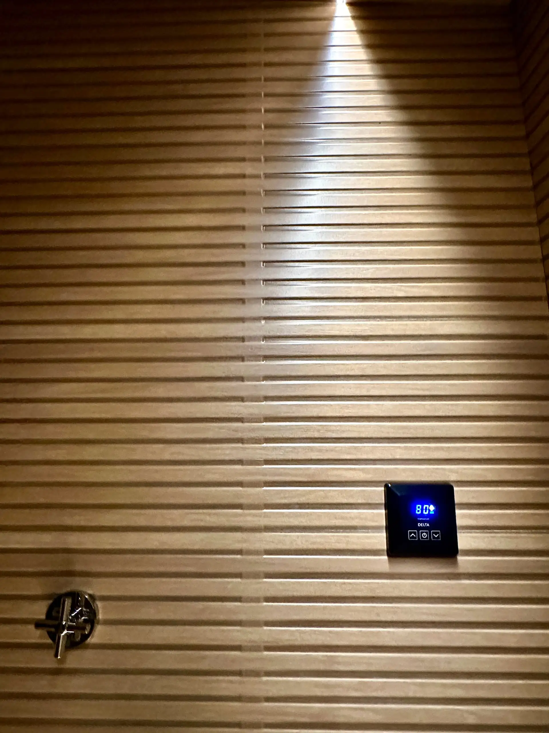 The steam room control panel showing the temperature