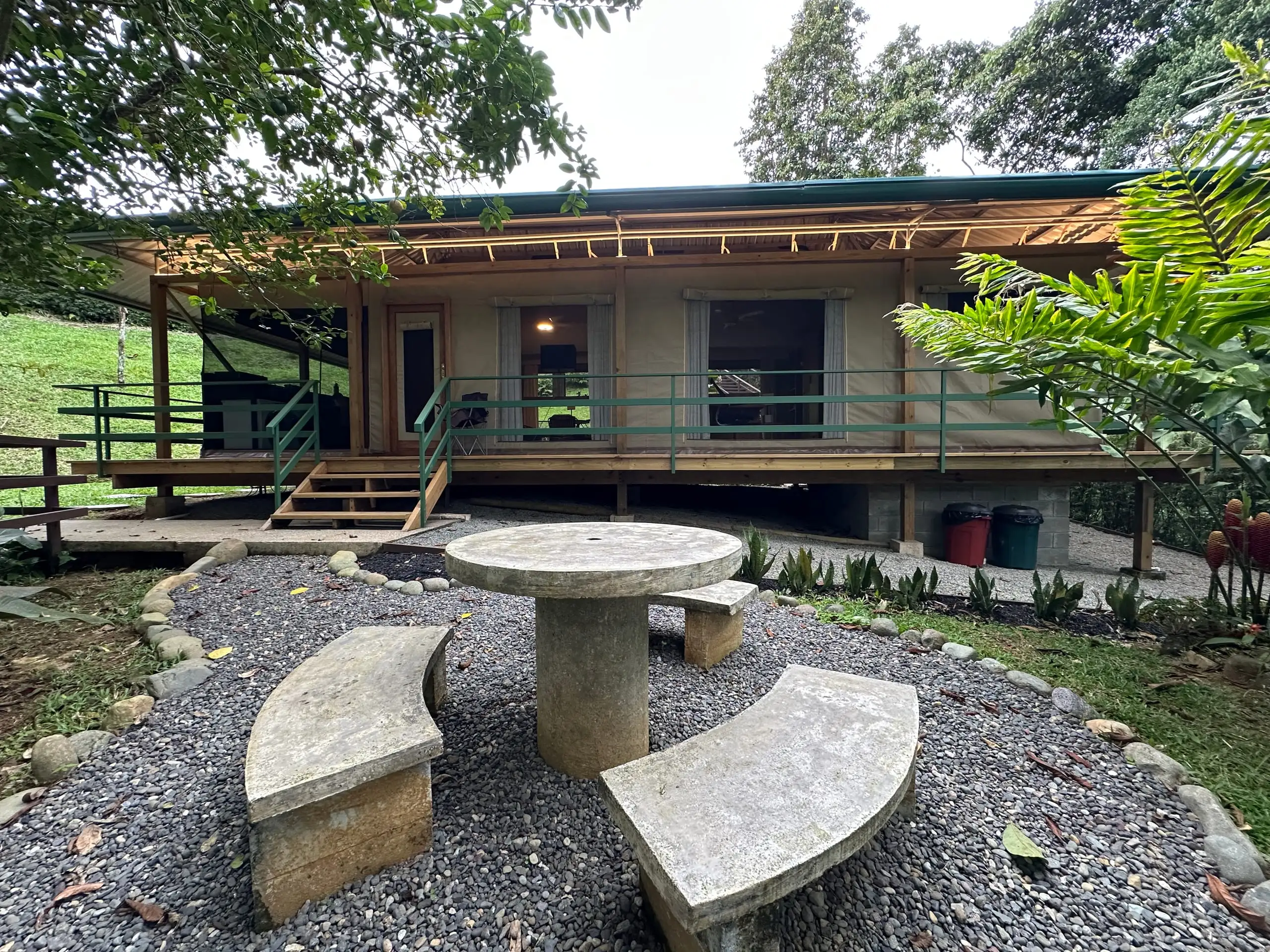 The stone table with the tent behind it